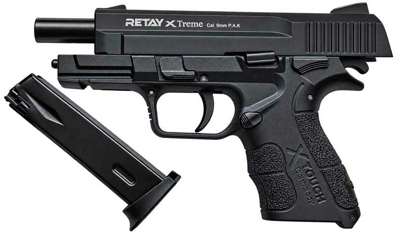 Фото стартового пістолета Retay XTreme на затворній зартимці з витягнутим магазином